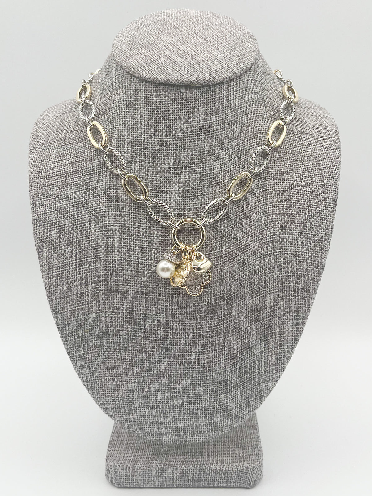 Quatrefoil charm necklace