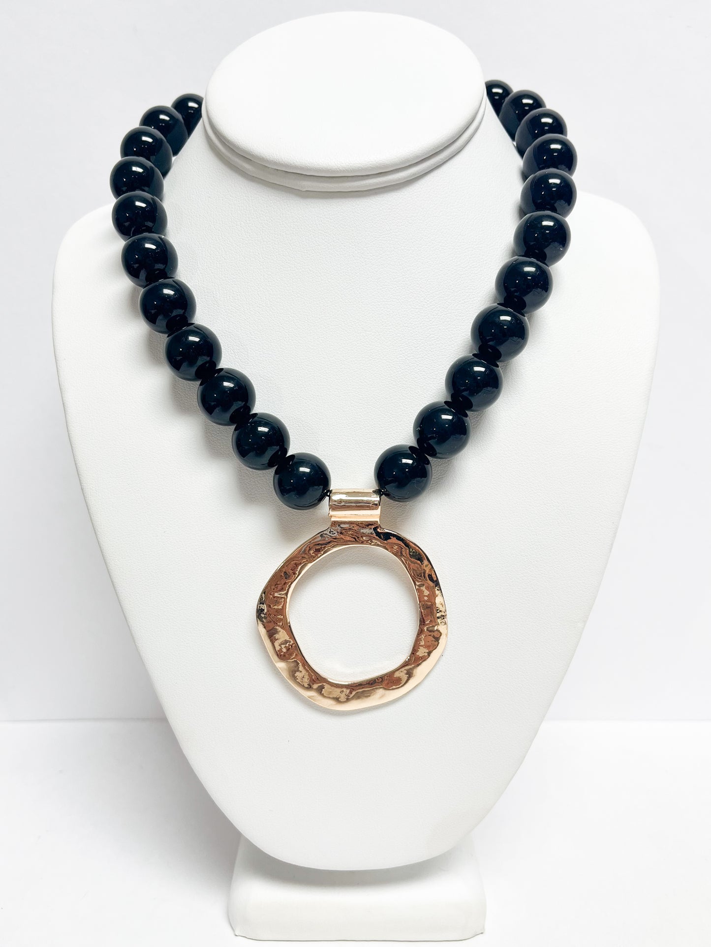Black beaded hammered circle pendant necklace