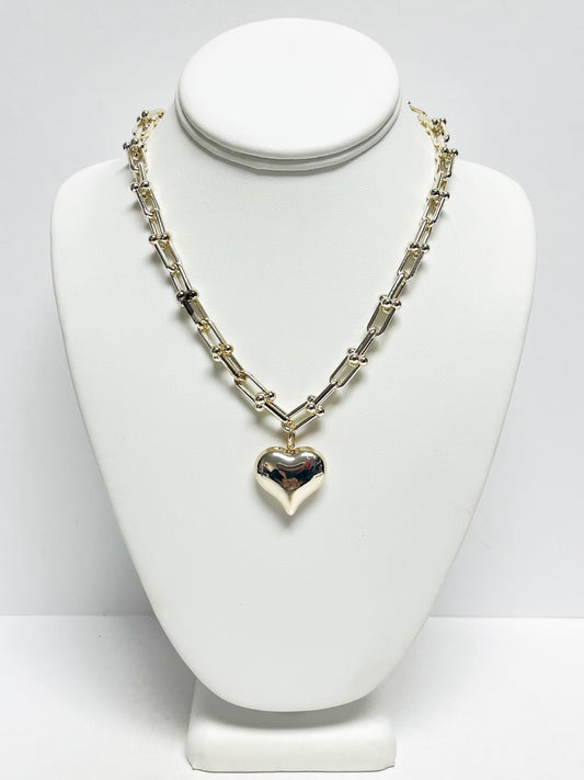 Gold heart pendant necklace