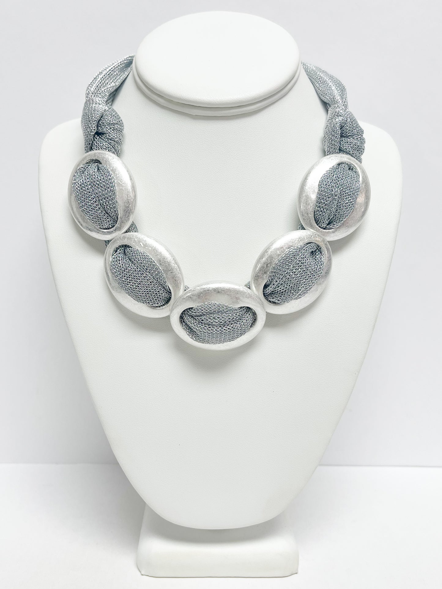 Multiple silver pendant necklace